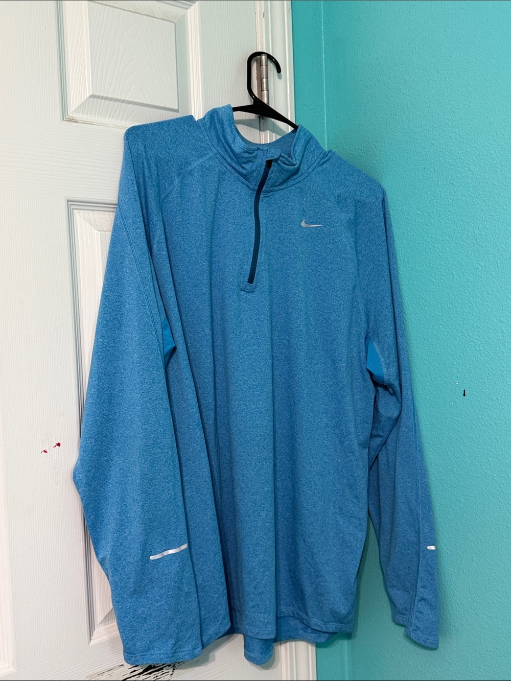 Nike woman’s Blue Dri-FIT Quarter-Zip Pullover Jacket